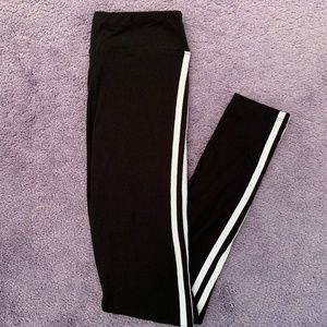 Black leggings with white stripe